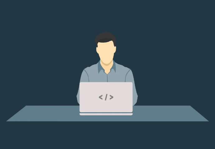 A flat vector illustration of a person sitting at a desk and working on a laptop. The laptop screen features a coding symbol (a forward slash between angle brackets), and the background is a solid dark blue.
